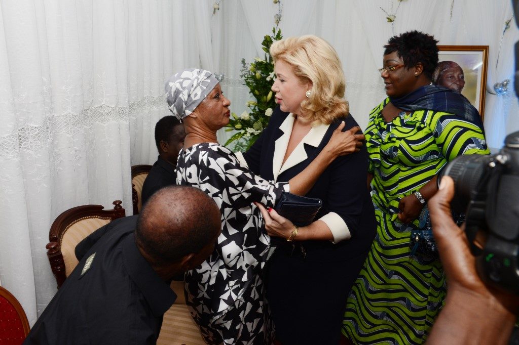 First Lady alongside Mrs. Bedié’s family