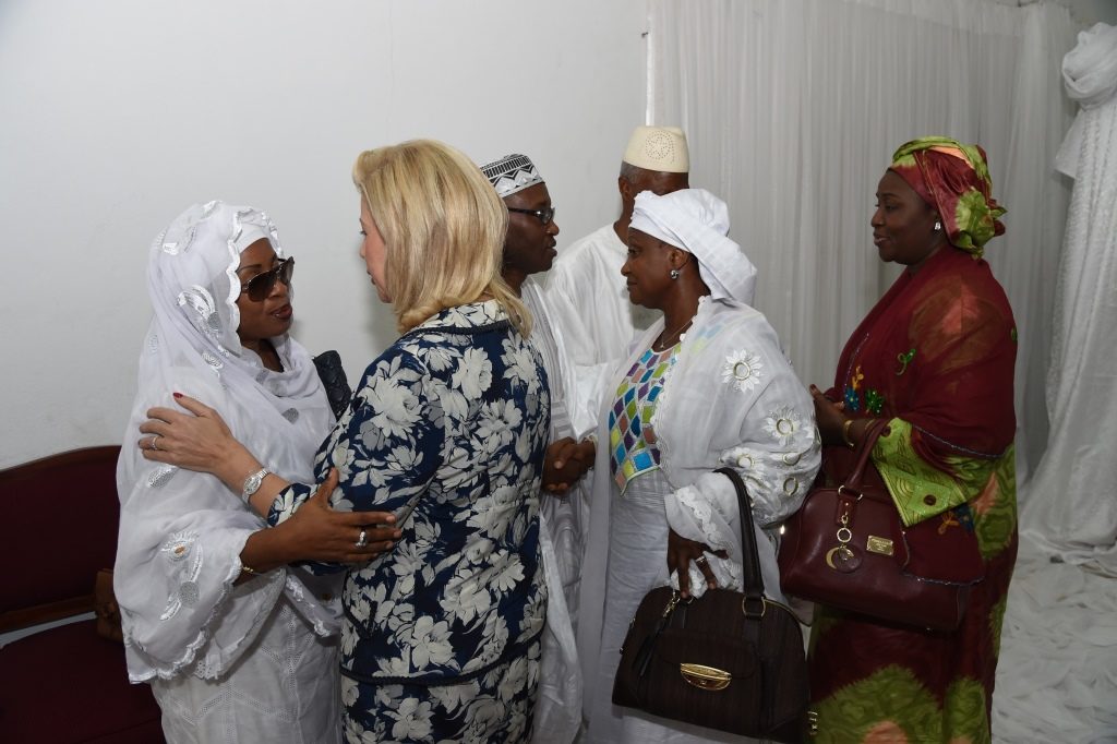 The First Lady Dominique Ouattara alongside the bereaved family