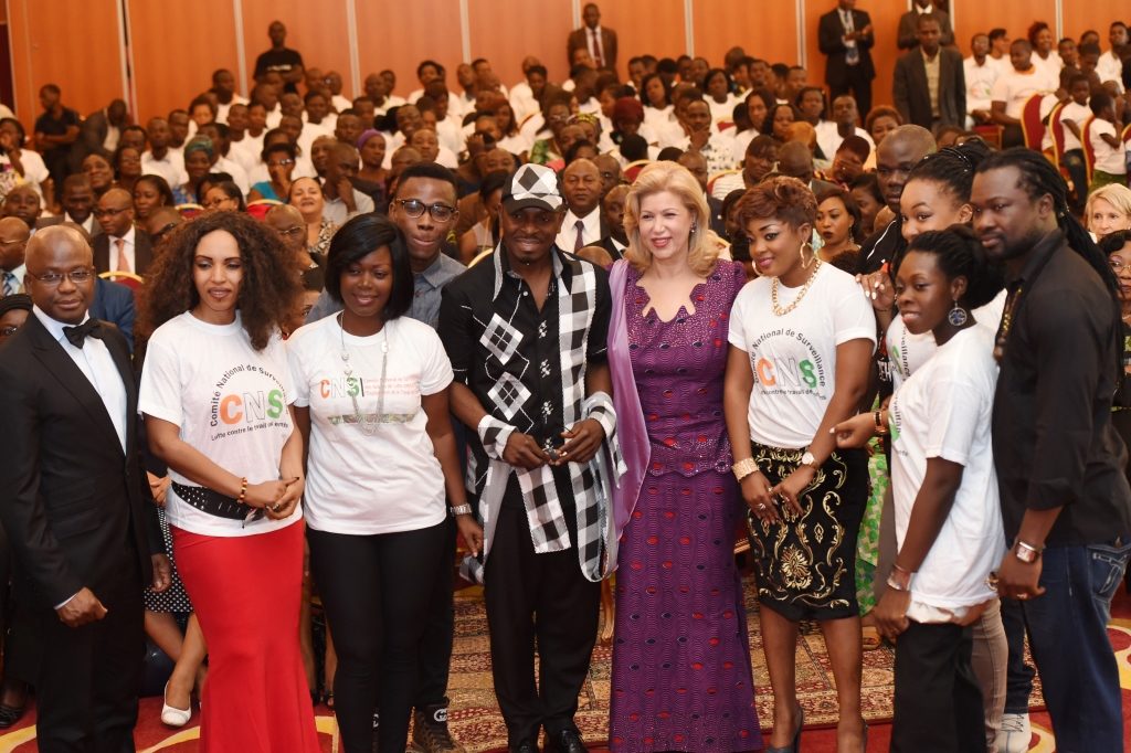 First Lady Dominique Ouattara in the company of the group of artists against child labor