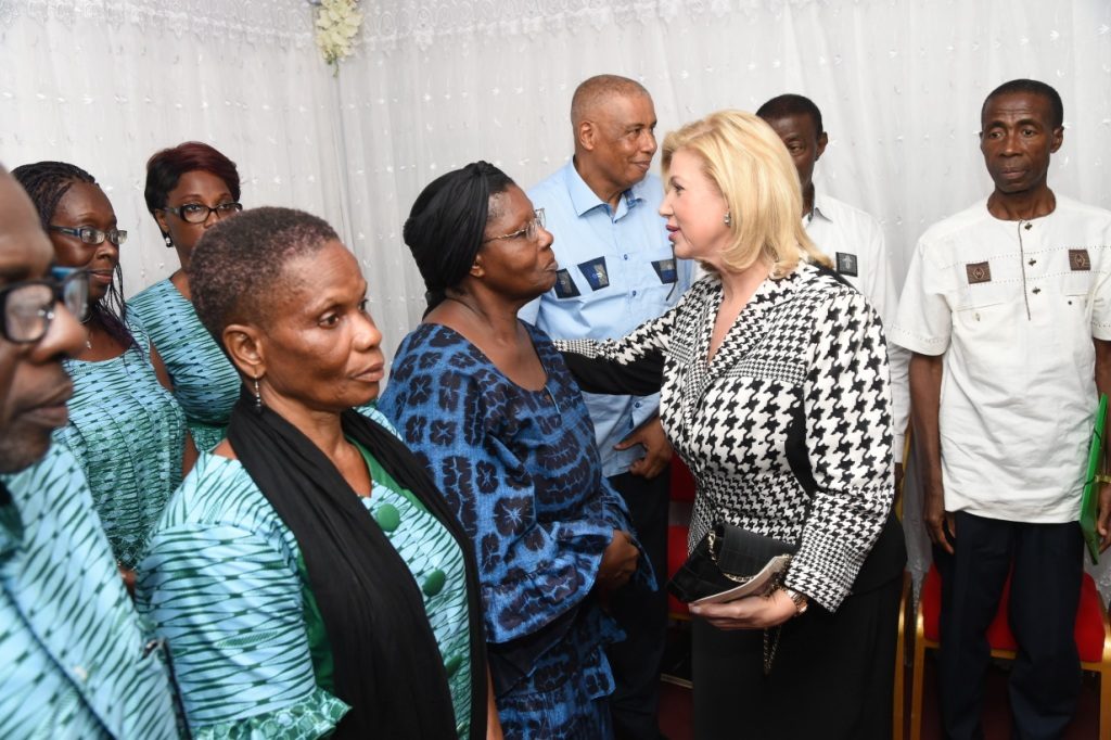 The First Lady, Dominique Ouattara alongside the Meledje and Tanon Families