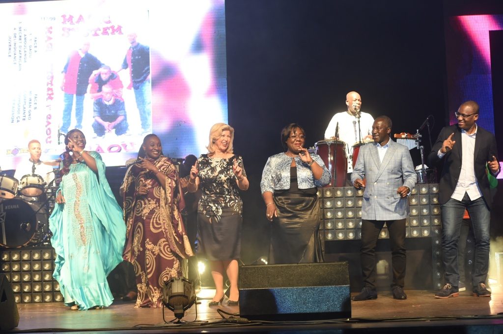 The First Lady, Dominique Ouattara Makes the Show With the Mythical Group of Zouglou